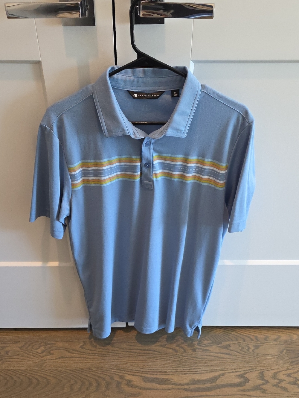 Travis Mathew Light Blue Polo with Yellow & White Stripes